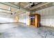 Large garage featuring a luxurious wooden sauna at 1104 Arden Trace Ct, Fuquay Varina, NC 27526