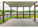 Enjoy outdoor living on this screened porch with views of the lush backyard at 1104 Arden Trace Ct, Fuquay Varina, NC 27526