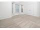 Bright bedroom featuring neutral walls, carpet, natural light from windows and closet at 11221 Paddy Hollow Ln, Raleigh, NC 27614