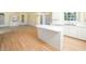 Kitchen with eat-in dining area and breakfast bar island at 11221 Paddy Hollow Ln, Raleigh, NC 27614