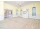 Open-concept living space with built-in shelving and lots of natural light at 11221 Paddy Hollow Ln, Raleigh, NC 27614
