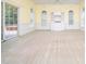 Bright living room showcasing built-in shelves and sliding door access at 11221 Paddy Hollow Ln, Raleigh, NC 27614