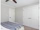 Bright bedroom with a ceiling fan and fresh white trim, complete with double closets at 1201 Kalworth Rd, Wake Forest, NC 27587