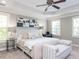 Spacious main bedroom with tray ceilings, large windows, and stylish decor at 1201 Kalworth Rd, Wake Forest, NC 27587