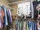 Well-organized walk-in closet with ample storage space and varied shelving at 1201 Kalworth Rd, Wake Forest, NC 27587