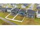 Aerial view of neighborhood with fenced-in backyards and well-manicured lawns at 125 Shadowdale Ln, Rolesville, NC 27571