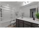 Neutrally designed bathroom featuring a bathtub, toilet, and vanity with granite counters at 125 Shadowdale Ln, Rolesville, NC 27571