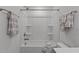 Neutrally designed bathroom featuring a bathtub, toilet, and bronze hardware at 125 Shadowdale Ln, Rolesville, NC 27571