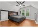 Stylishly decorated bedroom with a ceiling fan and lots of natural light at 14 Donnibrook, Fuquay Varina, NC 27526