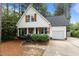 Charming cottage-style home with a welcoming front porch and well-maintained landscaping at 14 Donnibrook, Fuquay Varina, NC 27526
