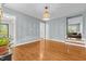 Bright living space with hardwood floors and natural light showcasing a warm ambiance at 14 Donnibrook, Fuquay Varina, NC 27526