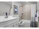 Functional bathroom with a tub-shower combination and vanity with ample storage space at 1424 Rollman Farm Rd, Raleigh, NC 27603