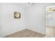 Bright bedroom features white walls, ceiling fan, and wood-look vinyl plank flooring at 149 Hutson Ln, Clayton, NC 27527