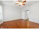 Spacious bedroom with hardwood flooring, ceiling fan, and ample natural light at 149 Hutson Ln, Clayton, NC 27527