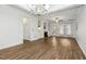 Open concept living room with wood floors, fireplace, and lots of natural light at 149 Hutson Ln, Clayton, NC 27527
