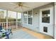 Relaxing screened patio with a ceiling fan, and a backyard view at 149 Hutson Ln, Clayton, NC 27527