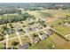 Picturesque aerial view showcasing a residential community with spacious lots and mature trees at 174 Tafton Dr, Wendell, NC 27591