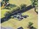 Cozy backyard detail with garden beds, a wooden fence, and play equipment at 174 Tafton Dr, Wendell, NC 27591