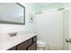 Bathroom featuring a white sink and a shower with a curtain at 174 Tafton Dr, Wendell, NC 27591