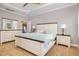Primary bedroom with a queen-sized bed, light gray walls, and carpeted flooring at 174 Tafton Dr, Wendell, NC 27591