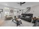 Bright living room with open layout, hardwood floors, and neutral decor at 190 Wendover Pkwy, Pittsboro, NC 27312