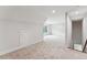 Carpeted attic space with white walls and a window to let in light at 2028 Pleasant Forest Way, Wake Forest, NC 27587
