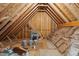 Unfinished attic showing the wooden beams and support structures at 2028 Pleasant Forest Way, Wake Forest, NC 27587