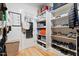 Walk-in closet with organizers and storage for handbags, shoes, and clothes at 204 Woodstaff Ave, Wake Forest, NC 27587