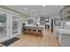 Bright kitchen with stainless steel appliances, hardwood floors, and pendant lighting over the island at 207 Old Forest Creek Dr, Chapel Hill, NC 27514