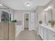 Bright bathroom featuring a soaking tub, walk-in shower, and double vanity with white countertops at 2073 Weston Green Loop, Cary, NC 27513