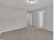 Bedroom with neutral paint and carpet and walk-in closet at 2073 Weston Green Loop, Cary, NC 27513