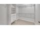 Walk-in closet with shelving and drawers at 2073 Weston Green Loop, Cary, NC 27513