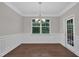 Traditional dining room is illuminated by natural light that features a view to a patio/porch space at 2073 Weston Green Loop, Cary, NC 27513