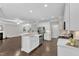 Spacious kitchen with stainless steel appliances open to the living room at 2073 Weston Green Loop, Cary, NC 27513