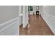 Elegant living area with hardwood floors, fireplace, and natural light at 2073 Weston Green Loop, Cary, NC 27513