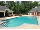 Community swimming pool with ample seating and a shaded gazebo for relaxing gatherings at 2073 Weston Green Loop, Cary, NC 27513