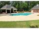 Community swimming pool area, complete with ample seating and shaded gazebo at 2073 Weston Green Loop, Cary, NC 27513