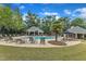 Community swimming pool area, complete with ample seating, umbrellas and shaded gazebo at 2073 Weston Green Loop, Cary, NC 27513