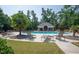 Community swimming pool area, complete with ample seating and shaded gazebo at 2073 Weston Green Loop, Cary, NC 27513