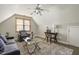 Cozy bedroom/office space with pitched ceilings, a ceiling fan, and carpeted floors at 213 Birch Creek Dr, Fuquay Varina, NC 27526