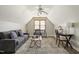 Comfortable bedroom/office space with pitched ceilings, a ceiling fan, and carpeted floors at 213 Birch Creek Dr, Fuquay Varina, NC 27526