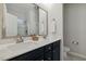Modern bathroom with double vanity, neutral walls, and seamless glass shower at 22 Chapman Ct, Wendell, NC 27591