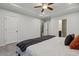Neutral bedroom with tray ceiling and access to en suite bathroom at 22 Chapman Ct, Wendell, NC 27591