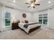 Light-filled bedroom with a modern farmhouse design and neutral color palette at 22 Chapman Ct, Wendell, NC 27591