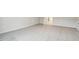 A bright and airy bedroom features plush carpeting and neutral walls at 22 Chapman Ct, Wendell, NC 27591