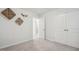 Bedroom with neutral carpet, closet, and a doorway at 22 Chapman Ct, Wendell, NC 27591