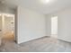 Neutral bedroom with carpet and walk-in closet, with light walls, creating a bright and airy space at 22 Chapman Ct, Wendell, NC 27591