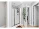 Bathroom with a glass-enclosed shower, white cabinets, and light tile flooring at 2207 Wimberly Woods Dr, Sanford, NC 27330
