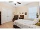 Cozy bedroom with double door closet, and a comfortable twin bed at 2207 Wimberly Woods Dr, Sanford, NC 27330