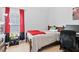 Cozy bedroom featuring a queen-sized bed, natural light, and modern décor at 2207 Wimberly Woods Dr, Sanford, NC 27330